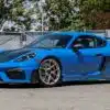 Minichamps - 1:18 Porsche Cayman GT4 RS Azul c/Paquete Weissach 2024