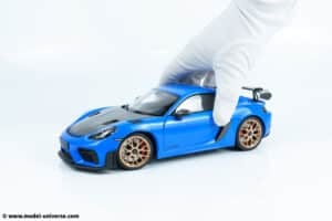 110062121 porsche cayman 718 gt4 rs blue diecast model 01