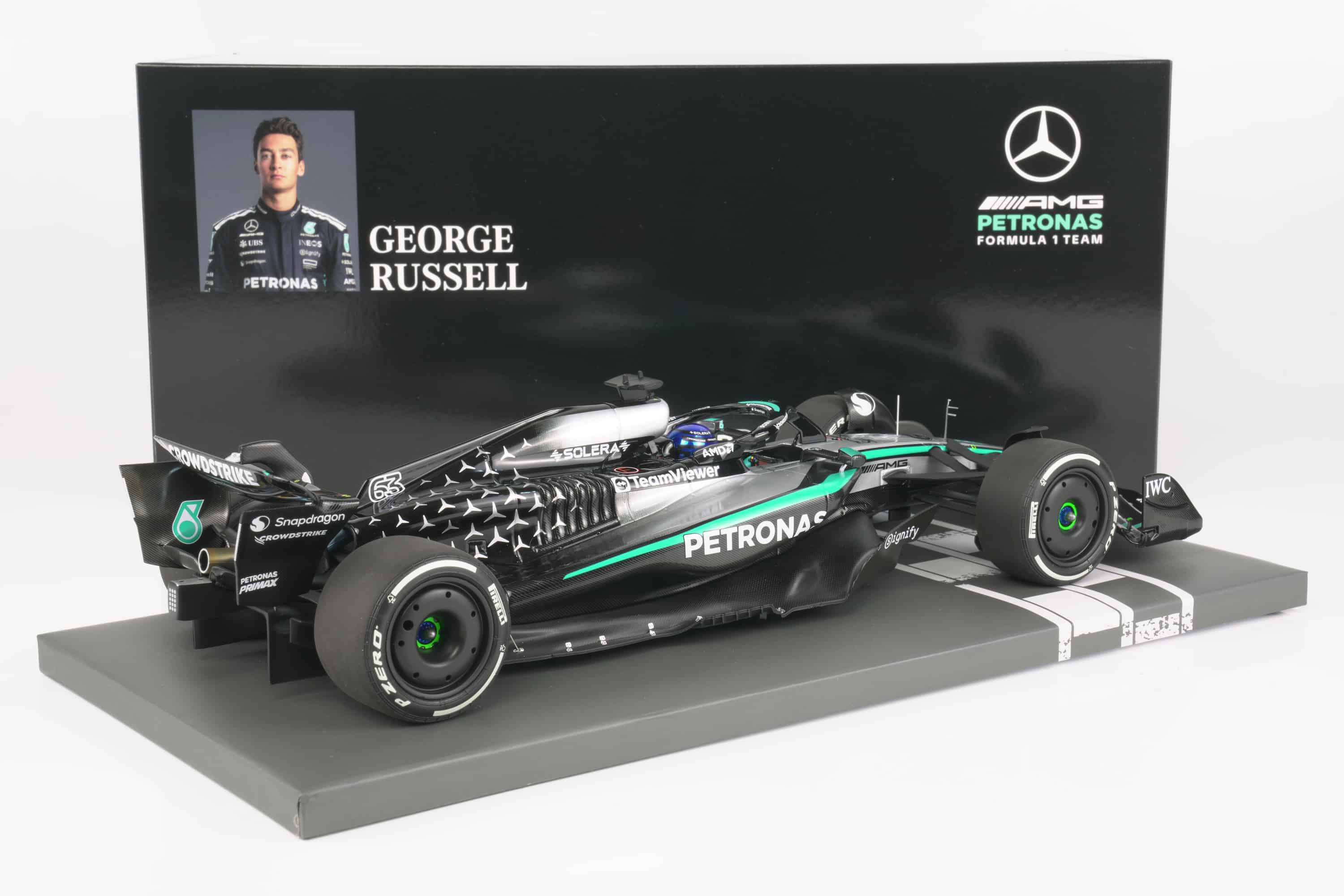 Minichamps 1:18 Mercedes-AMG Petronas F1 Team W16 E Performance No.63 George Russell Winner Singapore GP 2025 (117251863) Limited Edition Resin Model 2 Minichamps 1:18 Mercedes-AMG W16 E Performance No.63 George Russell Winner Singapore GP 2025 black silver resin model (117251863) - with Russell backdrop card, rear three-quarter