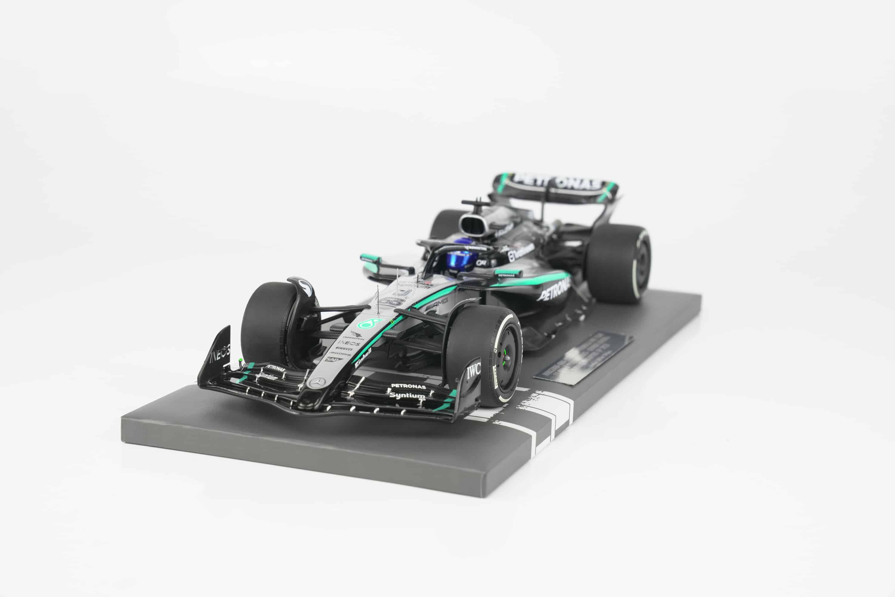Minichamps 1:18 Mercedes-AMG Petronas F1 Team W16 E Performance No.63 George Russell Winner Singapore GP 2025 (117251863) Limited Edition Resin Model 6 Minichamps 1:18 Mercedes-AMG W16 E Performance No.63 George Russell Winner Singapore GP 2025 black silver resin model (117251863) - front three-quarter view