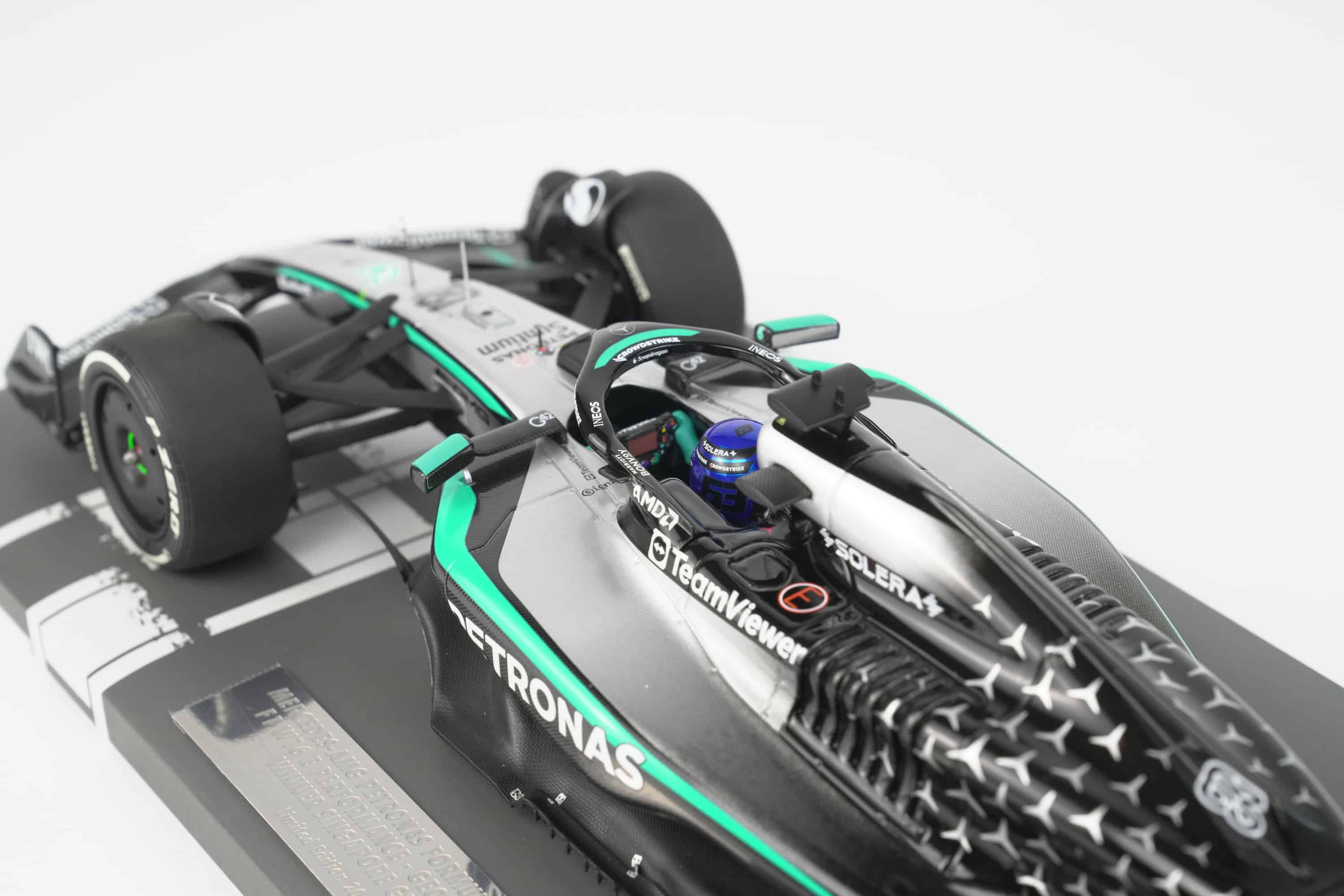 Minichamps 1:18 Mercedes-AMG Petronas F1 Team W16 E Performance No.63 George Russell Winner Singapore GP 2025 (117251863) Limited Edition Resin Model 10 Minichamps 1:18 Mercedes-AMG W16 E Performance No.63 George Russell Winner Singapore GP 2025 black silver resin model (117251863) - engine cover and halo detail