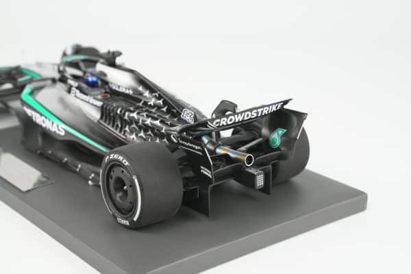 Minichamps 1:18 Mercedes-AMG Petronas F1 Team W16 E Performance No.63 George Russell Winner Singapore GP 2025 (117251863) Limited Edition Resin Model 22 Minichamps 1:18 Mercedes-AMG W16 E Performance No.63 George Russell Winner Singapore GP 2025 black silver resin model (117251863) - rear three-quarter view