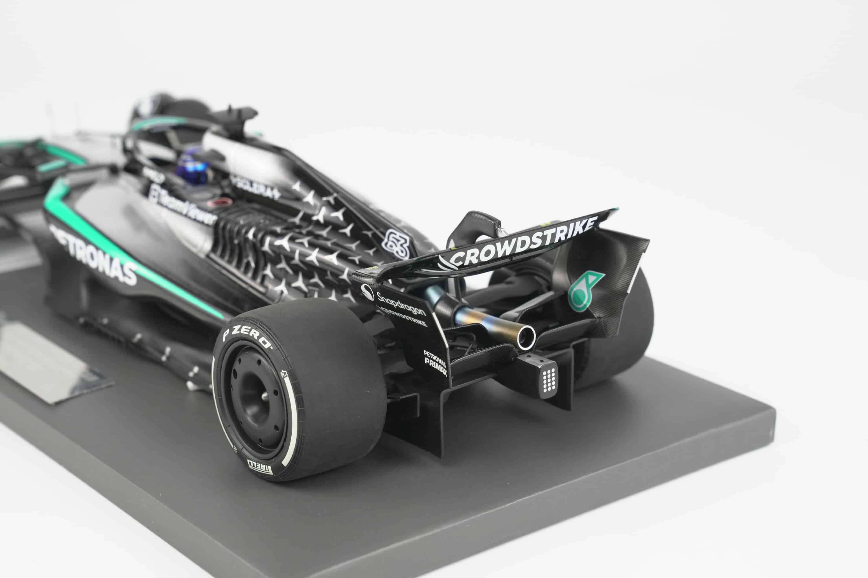 Minichamps 1:18 Mercedes-AMG Petronas F1 Team W16 E Performance No.63 George Russell Winner Singapore GP 2025 (117251863) Limited Edition Resin Model 11 Minichamps 1:18 Mercedes-AMG W16 E Performance No.63 George Russell Winner Singapore GP 2025 black silver resin model (117251863) - rear three-quarter view