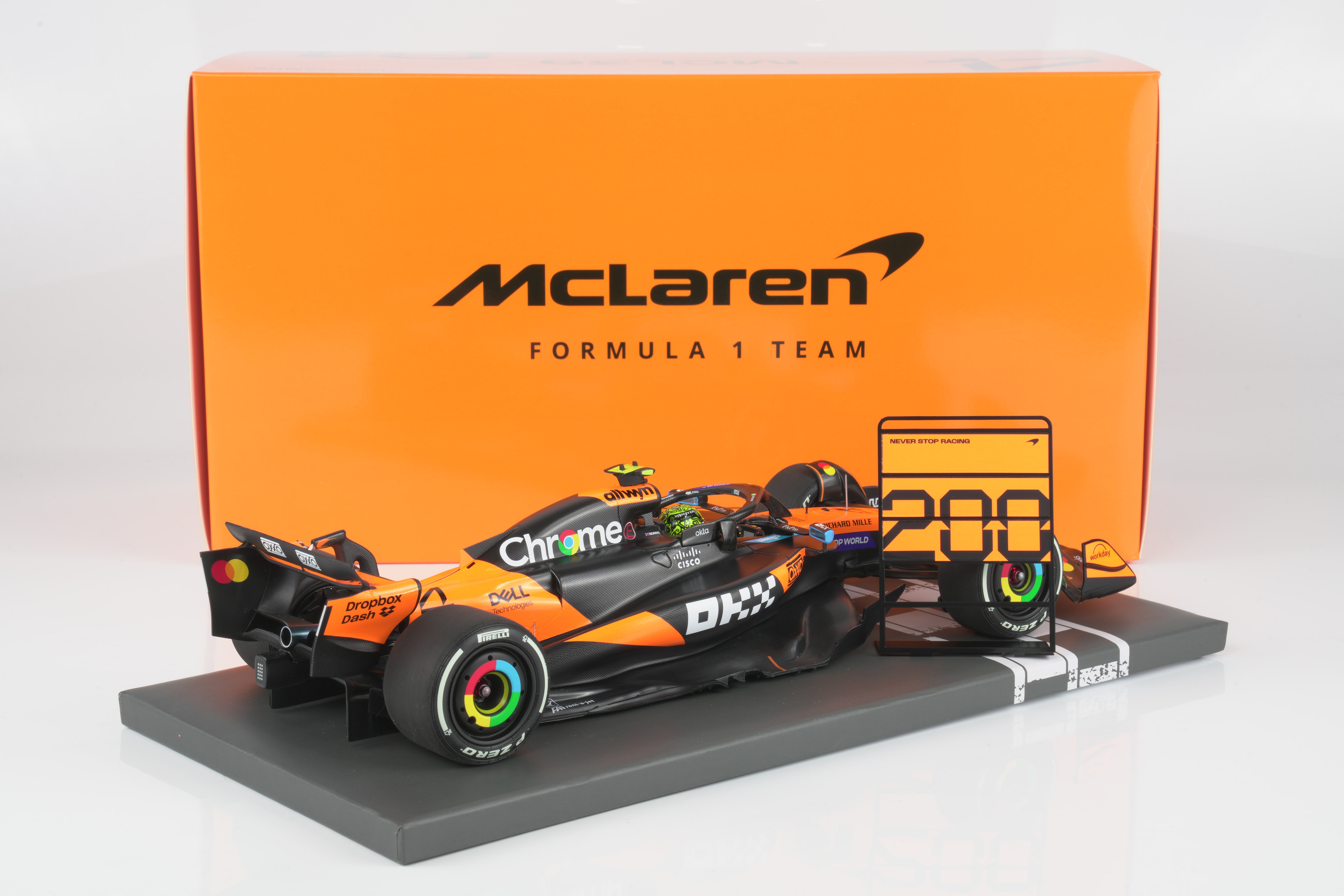 Minichamps 1:18 McLaren MCL39 No.4 Lando Norris Winner Hungarian GP 2025 McLaren 200 GP Wins with Pit Board (537253104) Limited Edition Resin Model 2 Minichamps 1:18 McLaren MCL39 No.4 Lando Norris Winner Hungarian GP 2025 McLaren 200 GP Wins resin model (537253104) - with box and 200 pit board, rear three-quarter