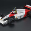 GP Replicas 1:18 McLaren MP4/6 #1 Ayrton Senna Winner Brazilian GP 1991 with Driver & Flag, Special Packaging