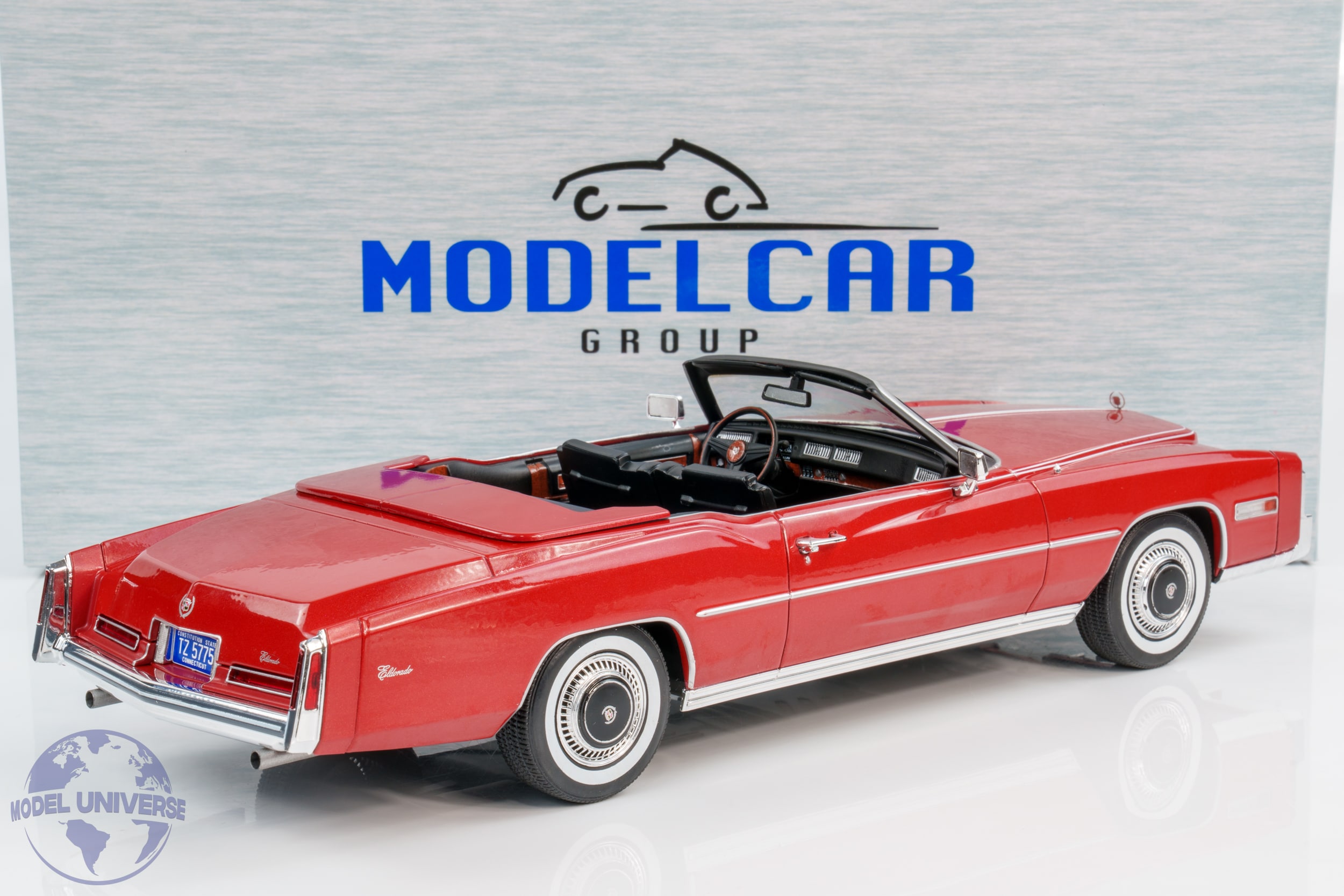 MCG - 1:18 Cadillac Eldorado Convertible 1976 Metallic Red - Diecast Model 3 MCG - 1:18 Cadillac Eldorado Convertible 1976 Metallic Red - Diecast Model