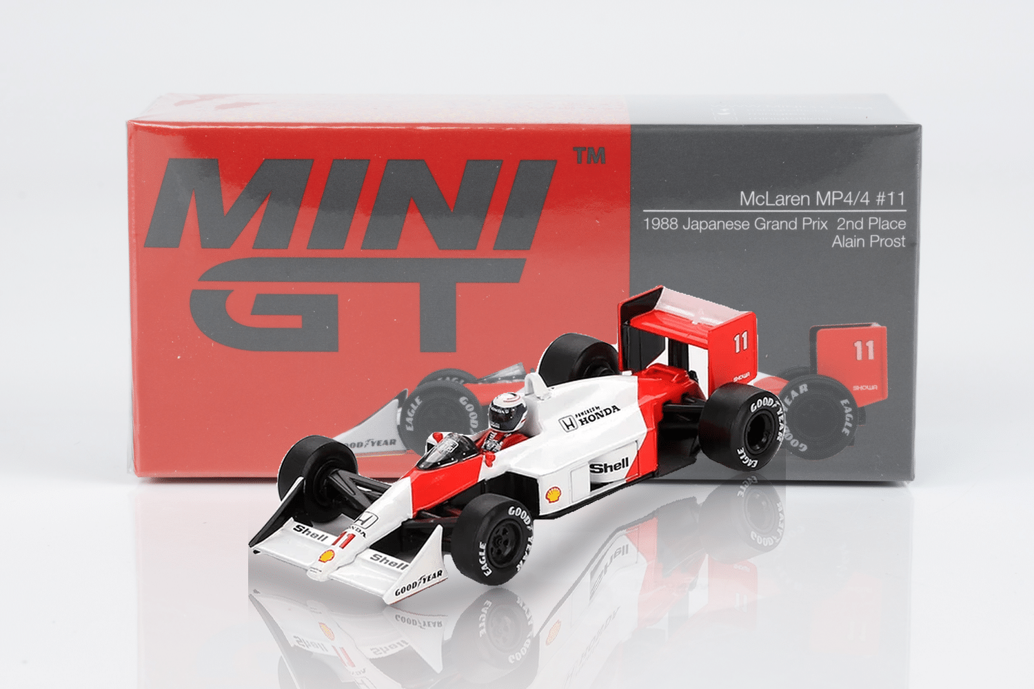 Mini GT 1:64 McLaren MP4/4 No.11 Alain Prost 2nd Place 1988 Japanese GP (Blister Package) (MGT01123-BL) Diecast Model 3 Mini GT 1:64 McLaren MP4/4 No.11 Alain Prost 2nd Place 1988 Japanese GP (Blister Package) (MGT01123-BL) Diecast Model - Image 3