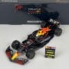 Minichamps 110221801 RB19 Max Verstappen World Champion 2022 Images