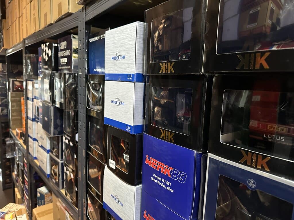 Diecast Model Shop - Model Universe 110 Boxed diecast model cars on the shelves of the Model Universe stockroom