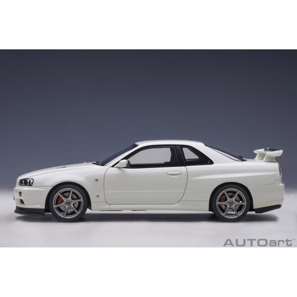 autoart - 1:18 nissan skyline gt-r (r34) v-spec ii (white pearl)