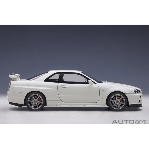 autoart - 1:18 nissan skyline gt-r (r34) v-spec ii (white pearl)