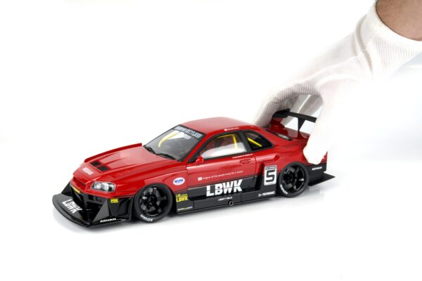 GT Spirit 1:18 Nissan Skyline R34 GT-R LB Super Silhouette Red 2020 (GT570) Limited Edition Resin Model 16 GT Spirit 1:18 Nissan Skyline R34 GT-R LB Super Silhouette Red (GT570) in hand showing scale