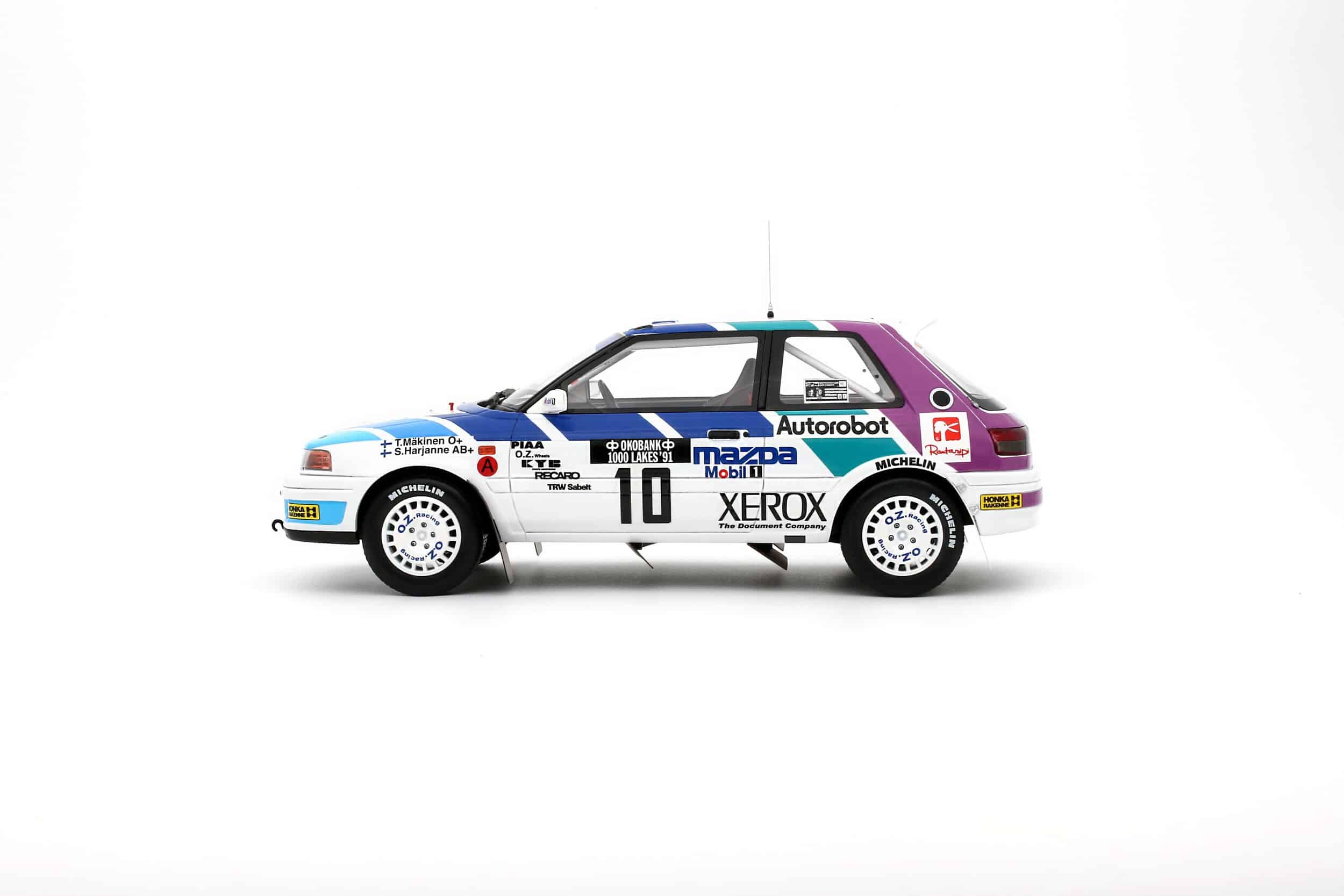 Otto Mobile 1:18 Mazda 323 GTX Gr.A Tommi Mäkinen 1000 Lakes Rally 1991 (OT1099) Limited Edition Resin Model 3 Otto Mobile 1:18 Mazda 323 GTX Gr.A Tommi Mäkinen 1000 Lakes Rally 1991 Limited Edition Resin Model