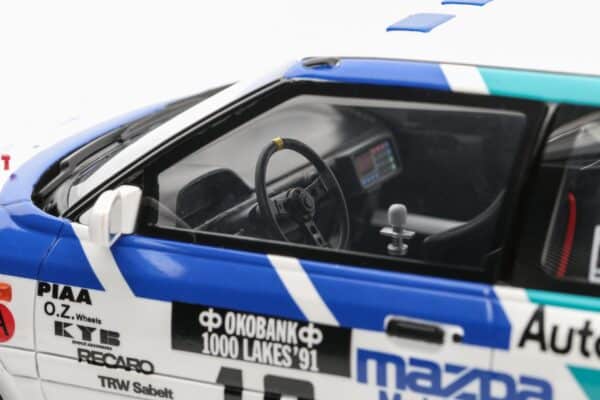 Otto Mobile 1:18 Mazda 323 GTX Gr.A Tommi Mäkinen 1000 Lakes Rally 1991 (OT1099) Limited Edition Resin Model 20 Otto Mobile 1:18 Mazda 323 GTX Gr.A Tommi Mäkinen 1000 Lakes Rally 1991 Limited Edition Resin Model
