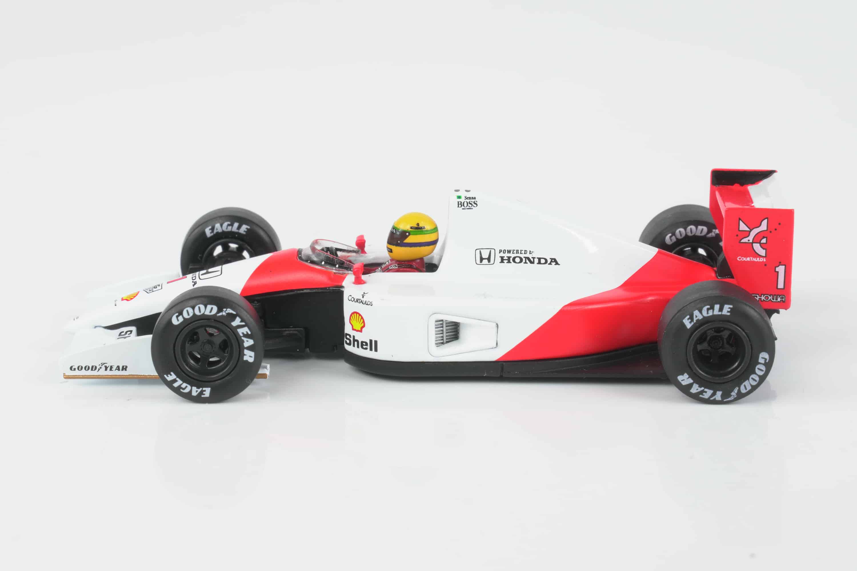 Mini GT - 1:64 McLaren MP4/6 No.1 Ayrton Senna 2nd Place Japanese GP 1991 (Blister Edition) - Diecast Model 4 Mini GT 1:64 McLaren MP4/6 No.1 Ayrton Senna Japanese GP 1991 blister edition diecast model (MGT01120-BL) - side view