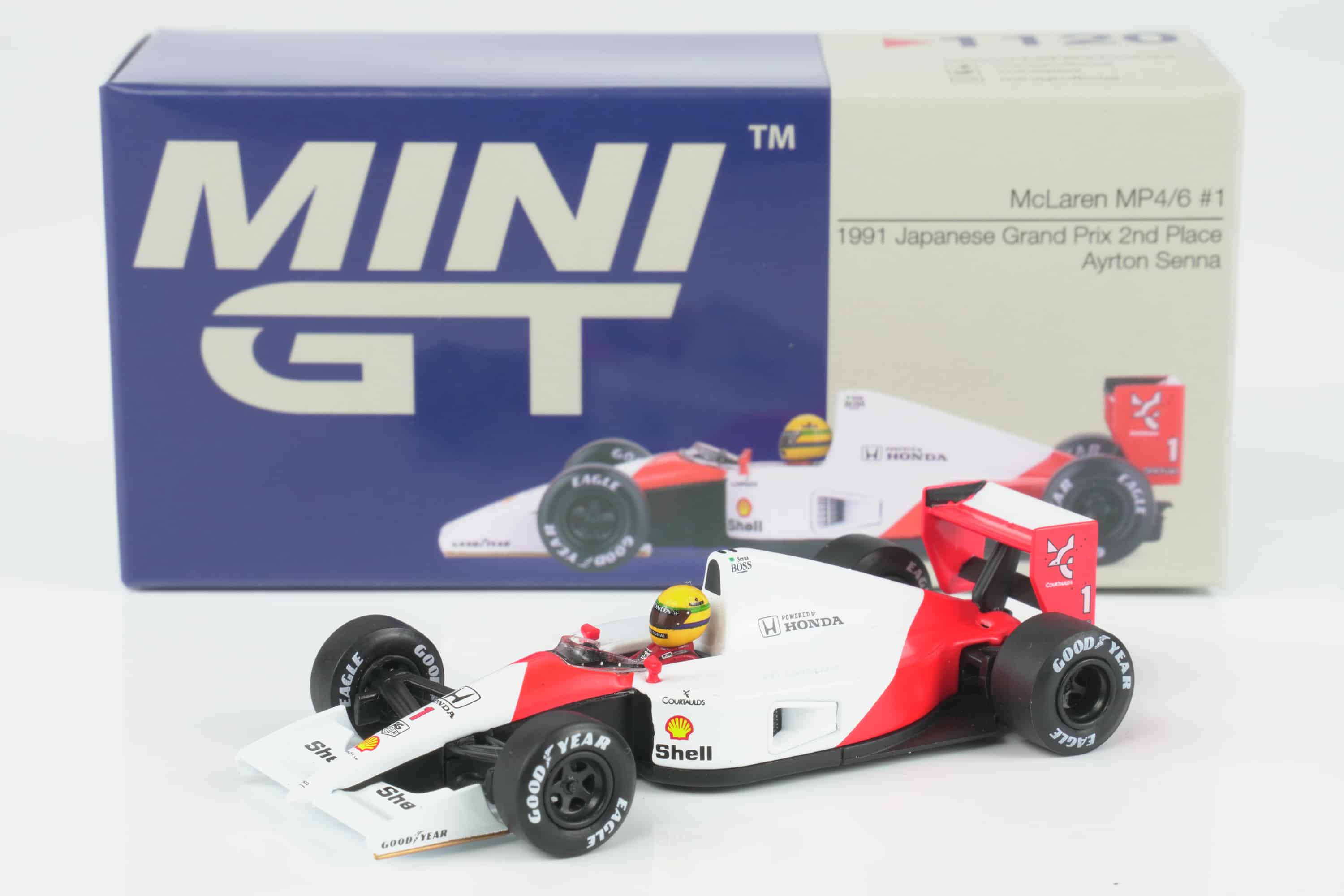 Mini GT - 1:64 McLaren MP4/6 No.1 Ayrton Senna 2nd Place Japanese GP 1991 - Diecast Model 3 Mini GT 1:64 McLaren MP4/6 No.1 Ayrton Senna 2nd Place Japanese GP 1991 diecast model (MGT01120-L) - with box, front three-quarter
