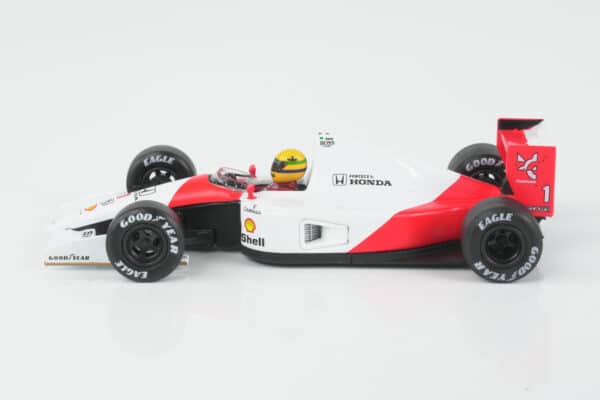 Mini GT - 1:64 McLaren MP4/6 No.1 Ayrton Senna 2nd Place Japanese GP 1991 - Diecast Model 10 Mini GT 1:64 McLaren MP4/6 No.1 Ayrton Senna 2nd Place Japanese GP 1991 diecast model (MGT01120-L) - side view