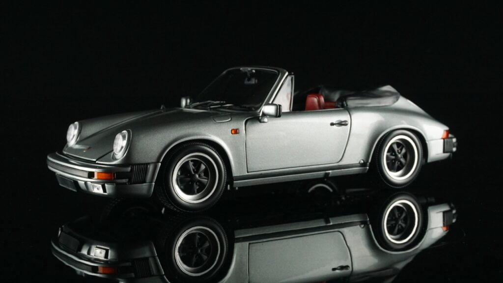 Porsche 911 Carrera 3.2 Cabriolet 1983 – Minichamps 1/18, Gris Métallisé (neuve)
