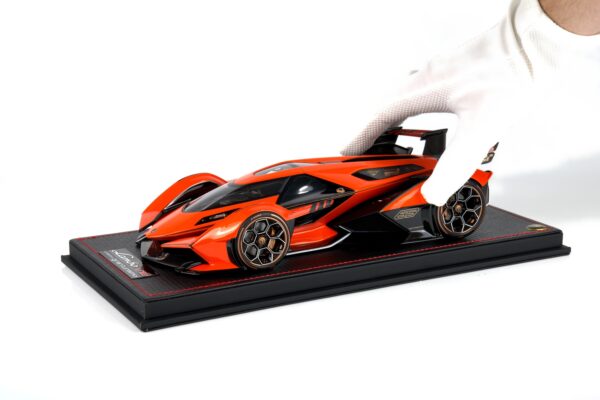 MR Collection - 1:18 Lamborghini V12 Vision Gran Turismo Orange Launch Version - Limited Edition Resin Model 13 MR Collection 1:18 Lamborghini V12 Vision Gran Turismo Arancio Egon orange resin model car shown with white-gloved hand for scale (LAMBO043B)