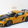 Norev 1:18 Porsche Cayman GT4 RS w/Weissach Bahama Yellow Pack 2023 (187252)