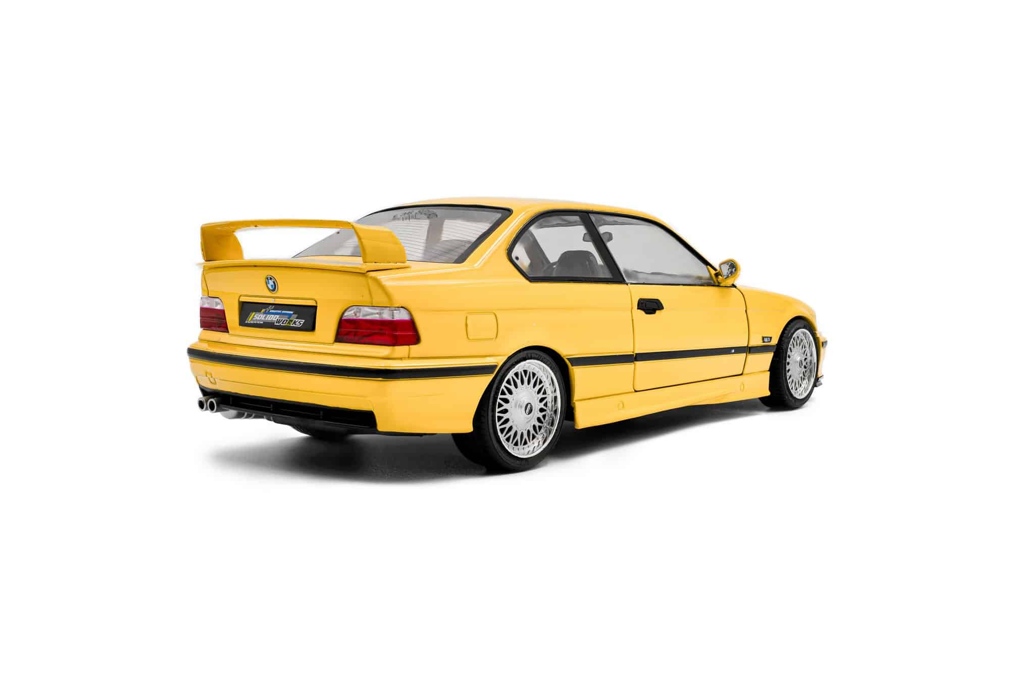 Solido 1:18 BMW M3 (E36) Coupe Dakar Yellow 1991 (S1803917) Diecast Model 2 Solido 1:18 BMW M3 (E36) Coupé Solido Works Dakar Yellow 1991 (S1803917) diecast model – rear three-quarter view