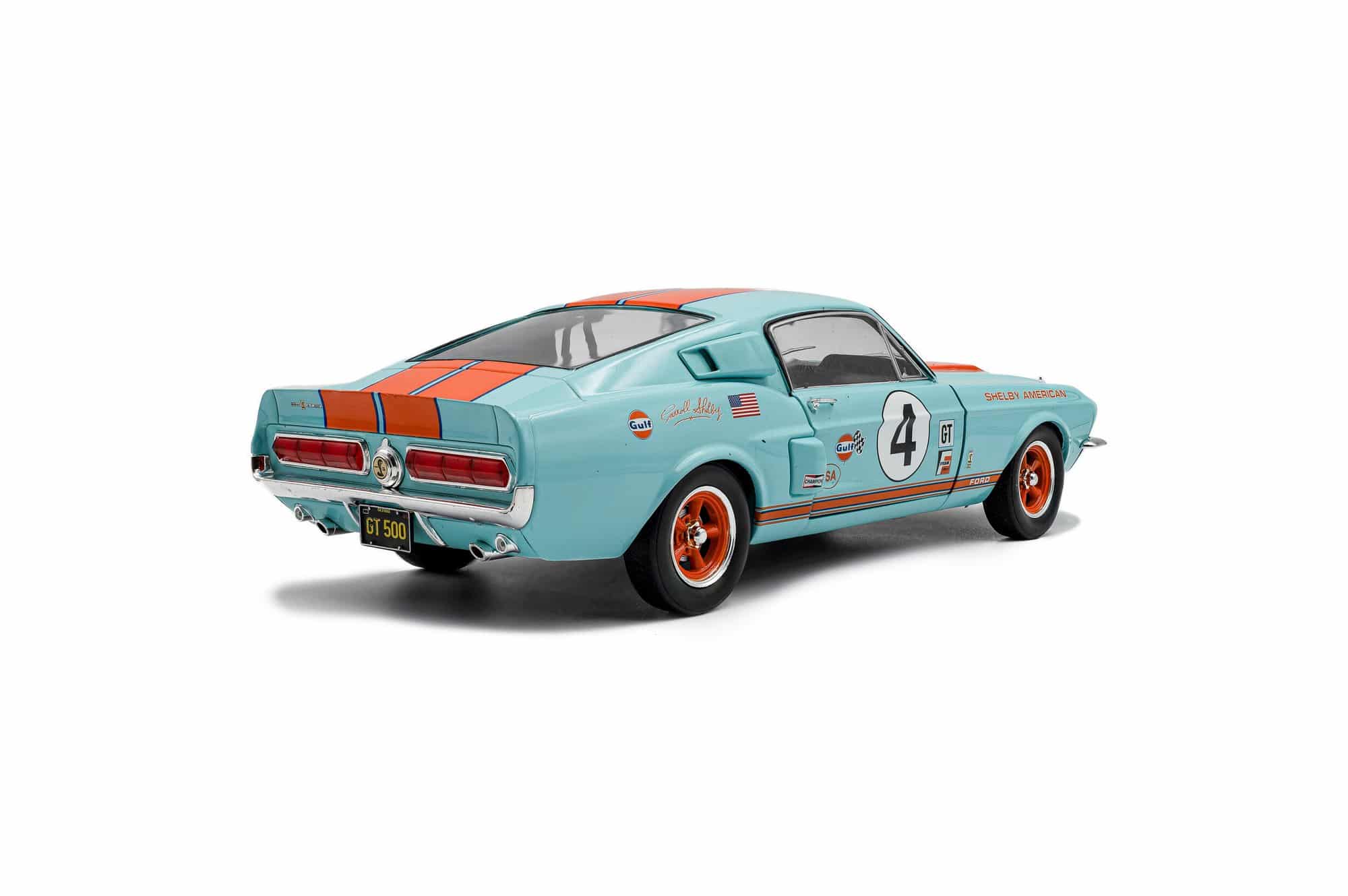 Solido 1:18 Ford Mustang Shelby GT500 Light Blue with Orange Stripes No.4 Gulf Racing Tribute 1967 (S1802911) Diecast Model 2 Solido 1:18 Shelby GT500 Racing Tribute 1967 (S1802911) diecast model – rear three-quarter view