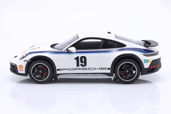 Spark - 1:18 Porsche 911 (992) Dakar Rally 1974 Design No.19 White - Porsche Exclusive Limited Edition Resin Model 9 Spark - 1:18 Porsche 911 (992) Dakar Rally 1974 Design No.19 White - Porsche Exclusive Limited Edition Resin Model